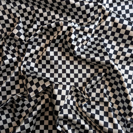 Checkered fabric pattern with black and white squares